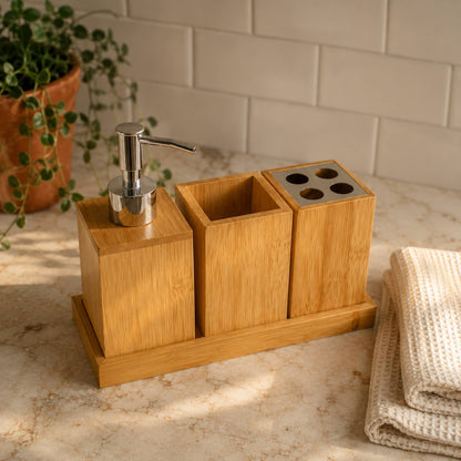 Bamboo bathroom organiser set on cream marble countertop with white subway tile background and folded textured towel, warm bathroom lifestyle