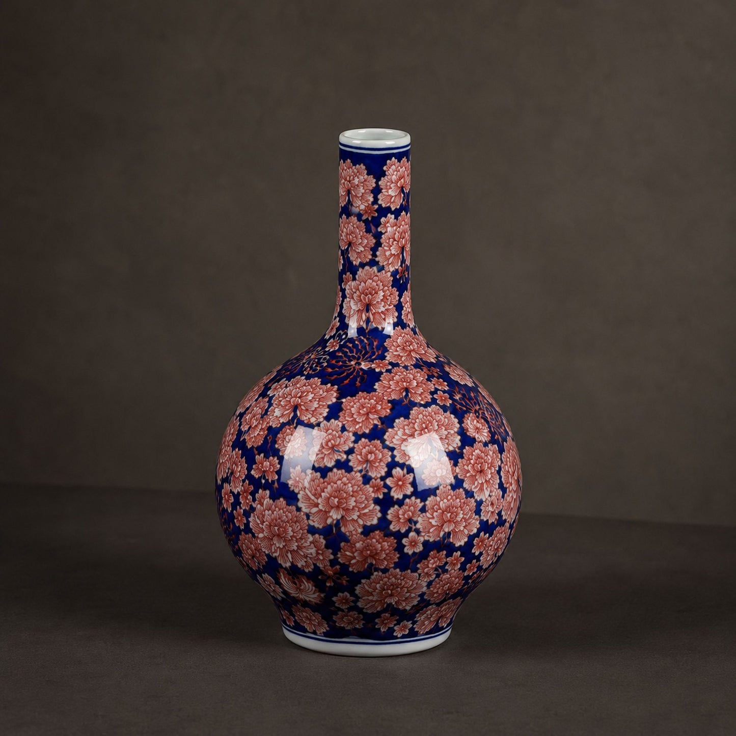 Cobalt aubergine porcelain celestial sphere vase catalogue shot on warm grey background