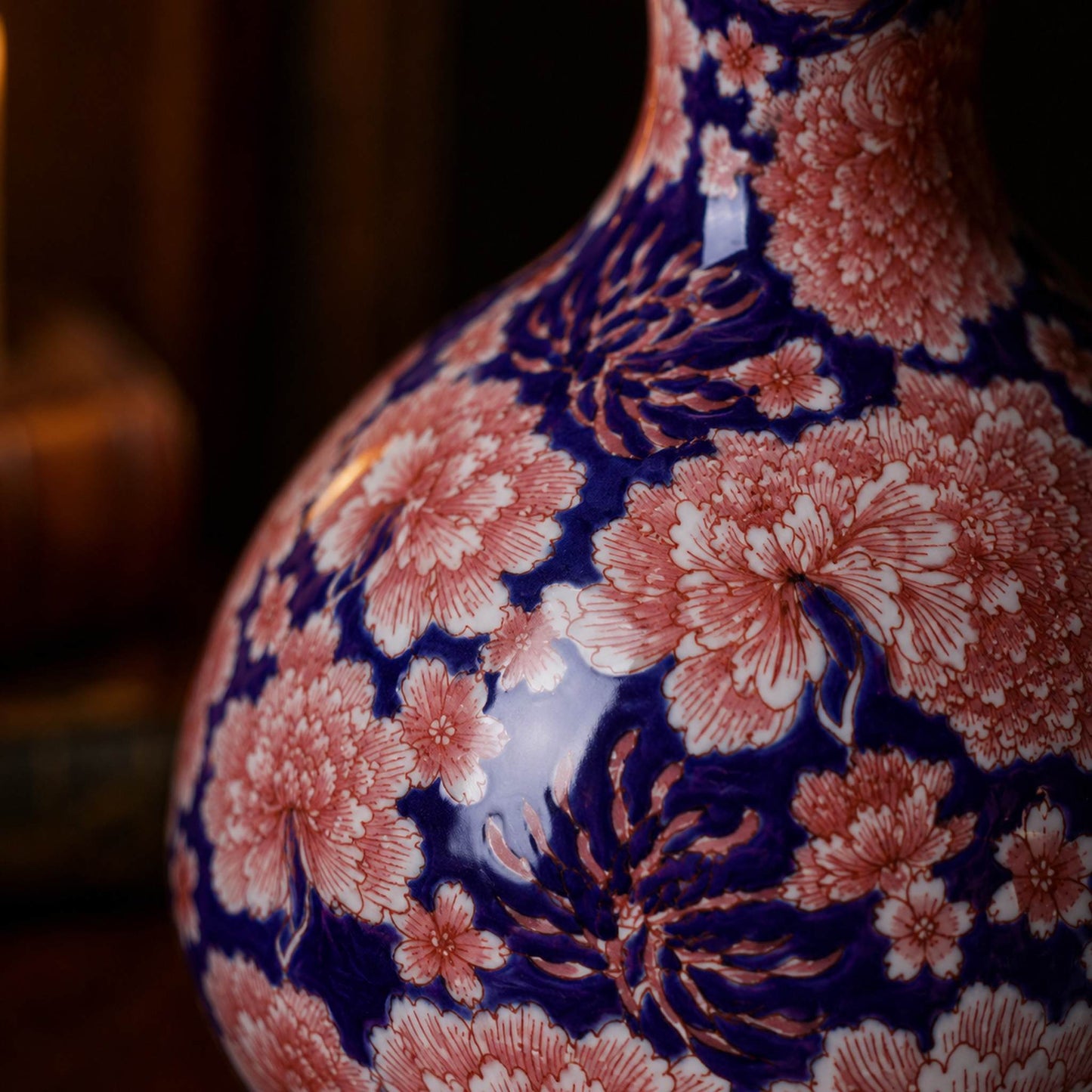 Cobalt aubergine porcelain vase brushwork close-up detail with floral hand-painted glaze