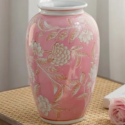 Pink altar-style chinoiserie ceramic vase on a rattan surface — Holm & Hearth