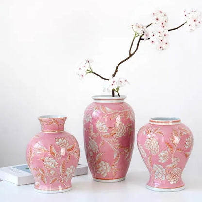 Three pink chinoiserie vases with a cherry blossom branch on white background — Holm & Hearth