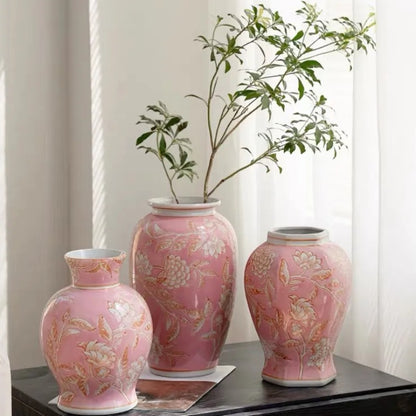 Three pink chinoiserie ceramic vases with a leafy branch in soft window light — Holm & Hearth
