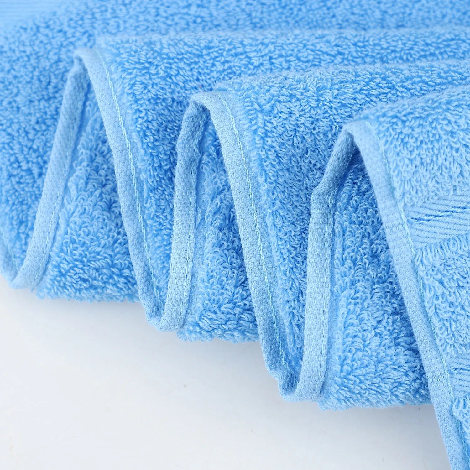Cotton bath towel showing twill border and corner hanging loop — Holm & Hearth