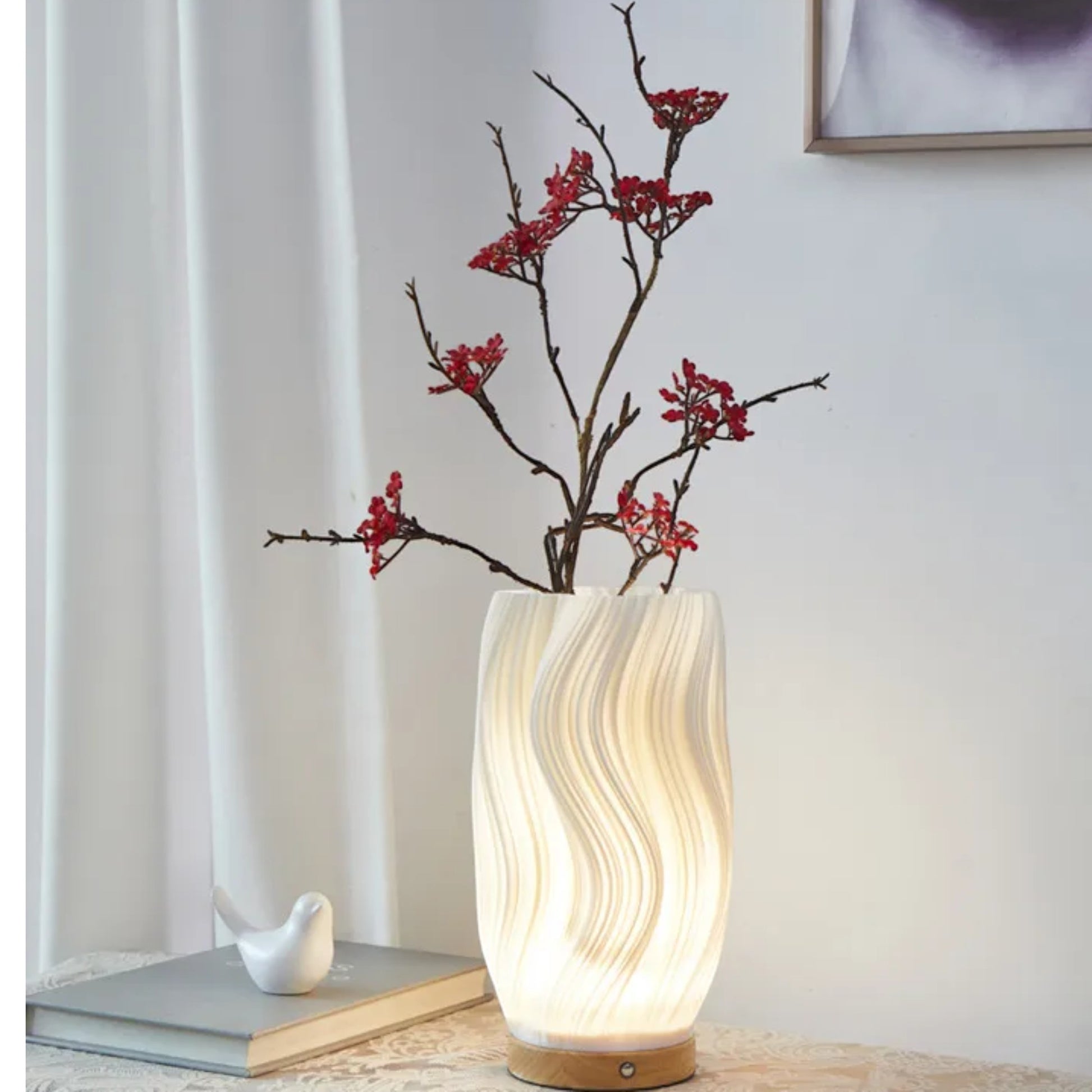 Wave variant cordless lamp beside cherry blossom branches — Holm & Hearth