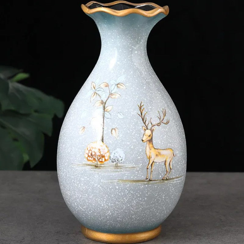 Pale ceramic vase with deer scene and scalloped gilt rim — Holm & Hearth