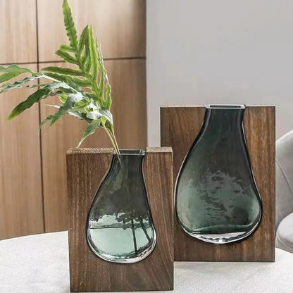 Pair of teardrop glass vases in wooden frames with fern stem — Holm & Hearth