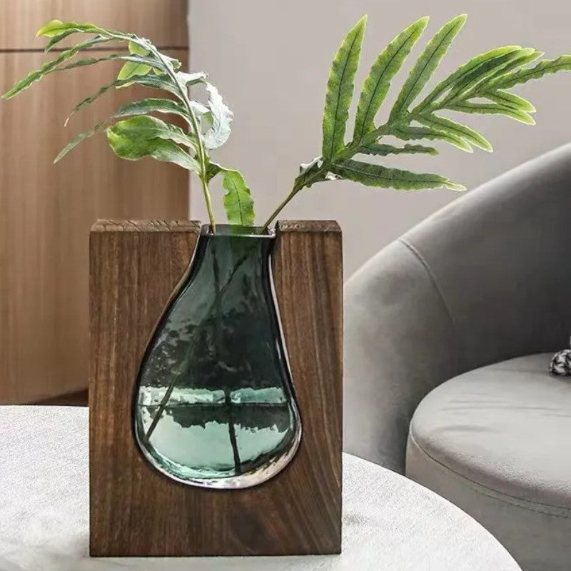 Small teardrop glass vase in wooden frame with fern stem — Holm & Hearth