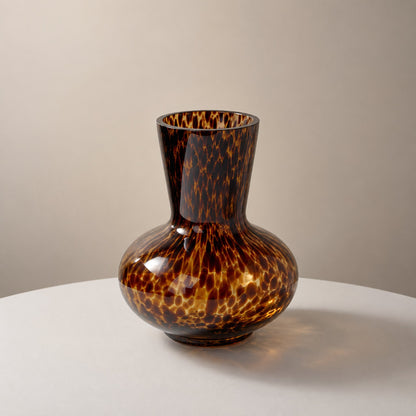 Leopard print glass round belly vase catalogue shot in warm amber tortoiseshell
